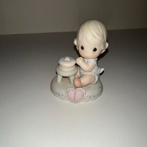 Precious Moments Figurine with Pink and Cream Accents
